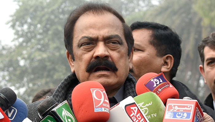 Federal Minister for Interior Rana Sanaullah Khan talking with media persons outside Governor House in Lahore, on December 22, 2023. — Online