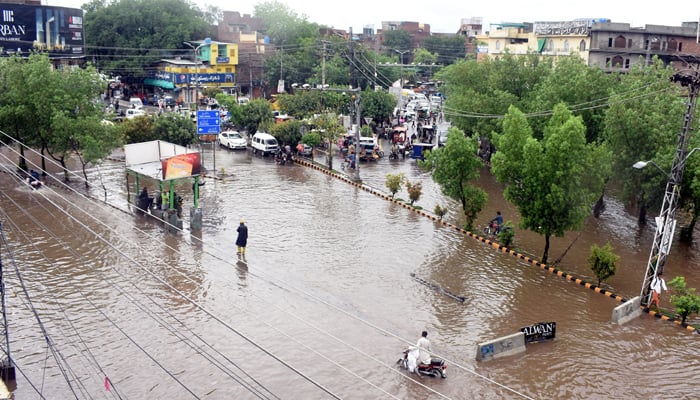 A view of the flooded roads after very first rain fall of the moon Soon spell, which needs the action of concern authority to protect the citizens from any trouble during the whole spell of Moon Soon, in Lahore on July 5, 2023. — Online
