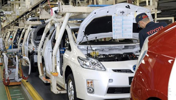 Cars lined up at a Toyota automobile factory. — Toyota