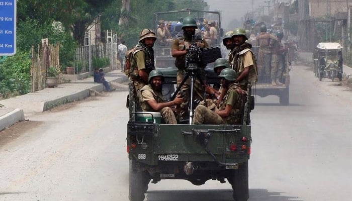 Soldiers driving in an army van in this undated photo. — Reuters/File