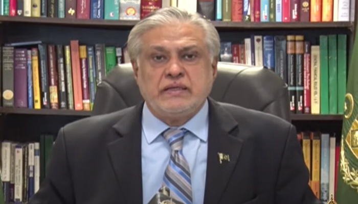 Finance Minister Ishaq Dar addressing a press conference in Islamabad, on July 13, 2023, in this still taken from a video. — YouTube/PTVNewsLive
