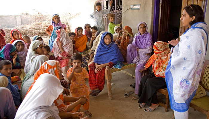 A lady health worker hosts an educational session on family planning for a group of women in a village in Punjab Province. — UNFPA