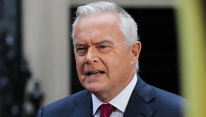 BBC journalist Huw Edwards speaks in front of a camera in Downing Street in central London on September 5, 2022. — AFP