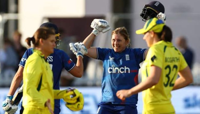 English womens players rejoice during match with Australia. — Reuters/File
