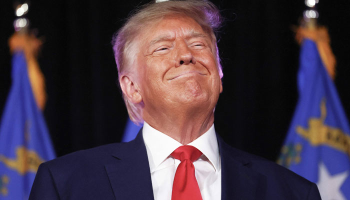 Former US President and Republican presidential candidate Donald Trump smiles before he delivers remarks at a Nevada Republican volunteer recruiting event at Fervent on July 8, 2023, in Las Vegas, Nevada. — AFP