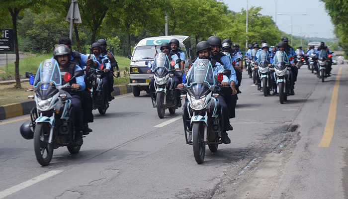 Rangers and Islamabad Police conduct a flag march on August 5, 2022. — APP