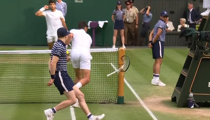 Serbian tennis player Novak Djokovic smashes his racket during Wimbledon final on Sunday. — Twitter/@jeffreyboadi_