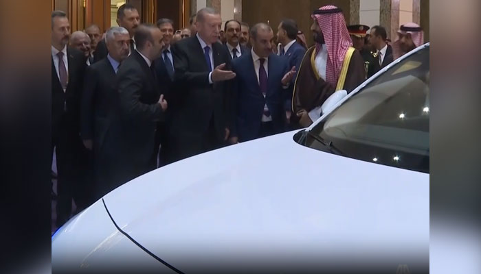 Turkish President Recep Tayyip Erdogan gifts electric car to Saudi Arabias Crown Prince Mohammed bin Salman. — Anadolu Agansi/Screengrab