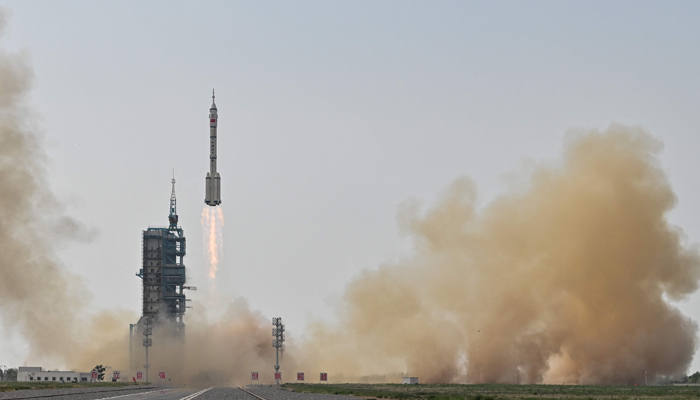 Long March-2F rocket, carrying the Shenzhou-16 Manned Space Flight Mission, lifts off on May 30 2023. — AFP