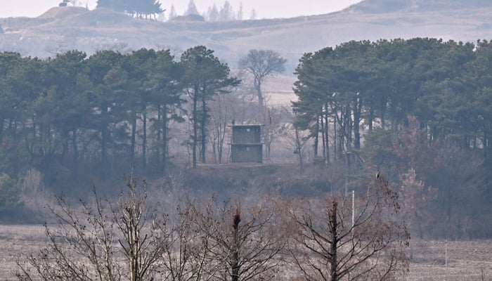 A North Korean guard post is seen from a South Korean checkpoint during a media tour at the truce village of Panmunjom in the Joint Security Area (JSA) of the Demilitarized Zone (DMZ) two Koreas on February 7, 2023. — AFP