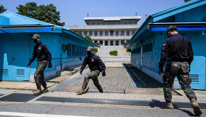 In this photo taken on May 9, 2023, South Korean soldiers change positions at the truce village of Panmunjom in the Joint Security Area (JSA) of the Demilitarised Zone (DMZ). — AFP