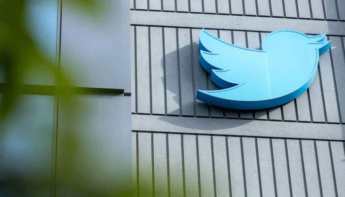 The Twitter logo is seen on a sign on the exterior of Twitter headquarters in San Francisco, California, US, October 28, 2022. — AFP