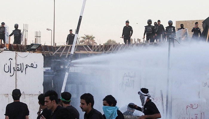 Security forces deploy a water cannon as protesters gather near the Swedish embassy in Baghdad hours after the embassy was stormed and set on fire ahead of an expected Quran burning in Stockholm, in Baghdad, Iraq, July 20, 2023. — Reuters