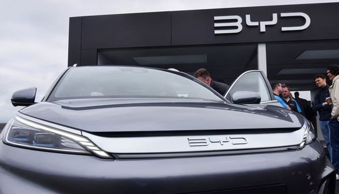 Members of the press and the general public check out the Atto 3 electric SUV made by Chinese carmaker BYD, at the Fully Charged Live electric vehicle trade show in Farnborough, Britain, April 28, 2023. — Reuters
