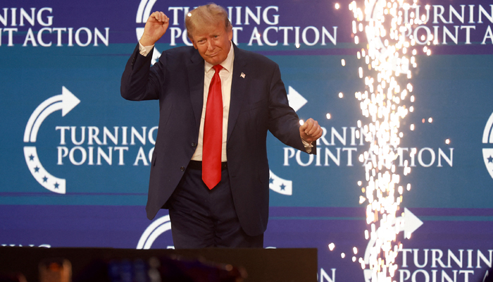 Former President Donald Trump briefly dances after he spoke at the Turning Point Action conference as he continues his 2024 presidential campaign on July 15, 2023, in West Palm Beach, Florida. — AFP