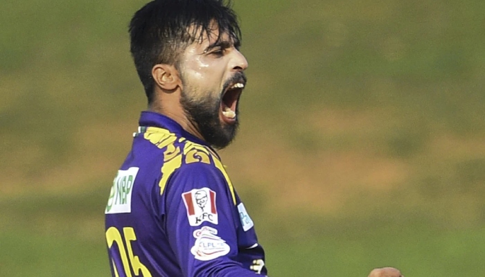 Mohammad Amir celebrates during a match in this undated file photo. — AFP