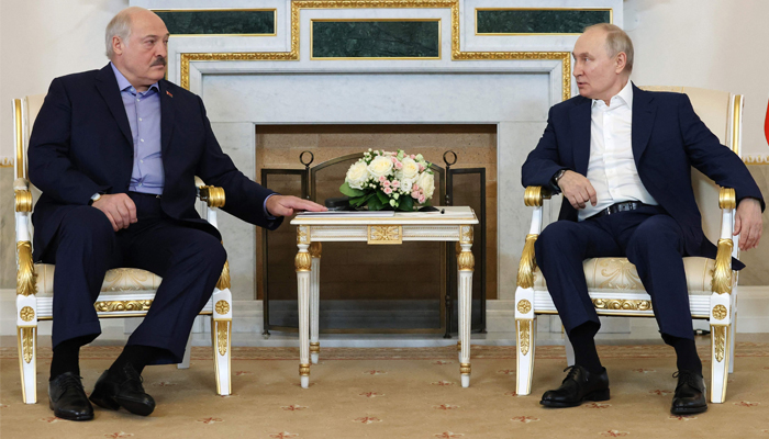 Russias President Vladimir Putin (R) meets with Belarus President Alexander Lukashenko (L) at the Constantine Palace in Strelna, outside Saint Petersburg, on July 23, 2023. — AFP