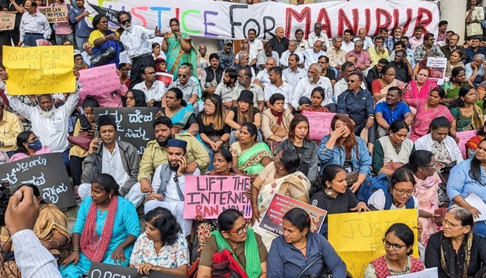People gather outside Town Hall to protest the alleged sexual assault of two tribal women in the eastern state of Manipur, in Bengaluru, India July 21, 2023. — Reuters