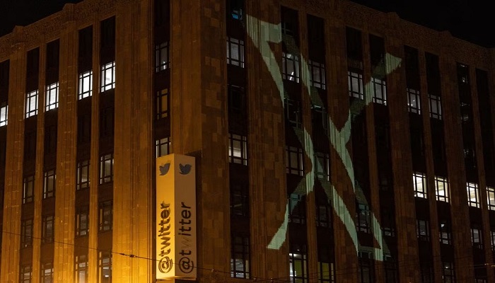 Twitters new logo is seen projected on the corporate headquarters building in downtown San Francisco, California, U.S. July 23, 2023. — Reuters