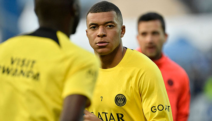 (FILES) Paris Saint-Germain´s French forward Kylian Mbappe looks on as he warms up before the French L1 football match between AJ Auxerre and Paris Saint-Germain (PSG) at Stade de l´Abbe-Deschamps in Auxerre, central France, on May 21, 2023.—AFP