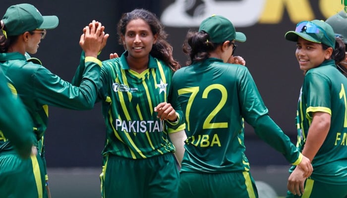 Players of the Pakistan womens cricket team celebrate a dismissal during a match. — PCB