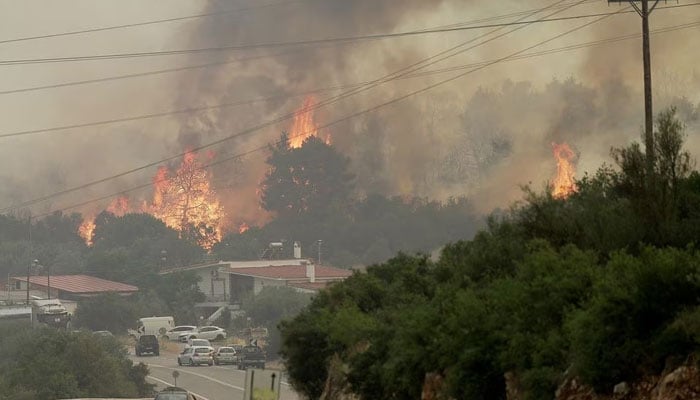 A wildfire burns near the village of Agios Sotira, west of Athens, Greece, July 20, 2023. — Reuters