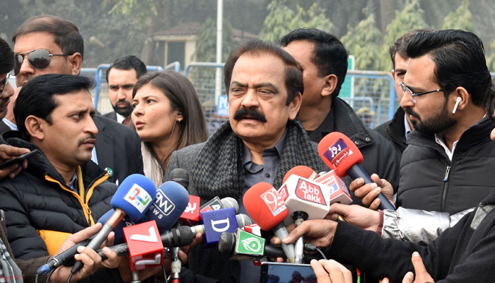 Interior Minister Rana Sanaullah Khan talks to journalists outside the Governor House in Lahore on December 22, 2023. — Online