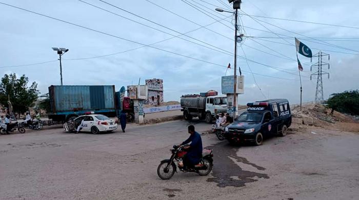 Two people swept away by flow of water on Korangi's causeway
