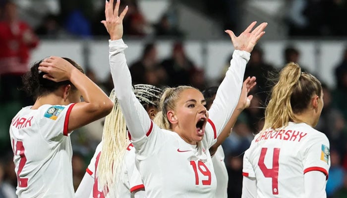 Adriana Leon celebrates scoring Canadas second goal against the Republic of Ireland.—AFP