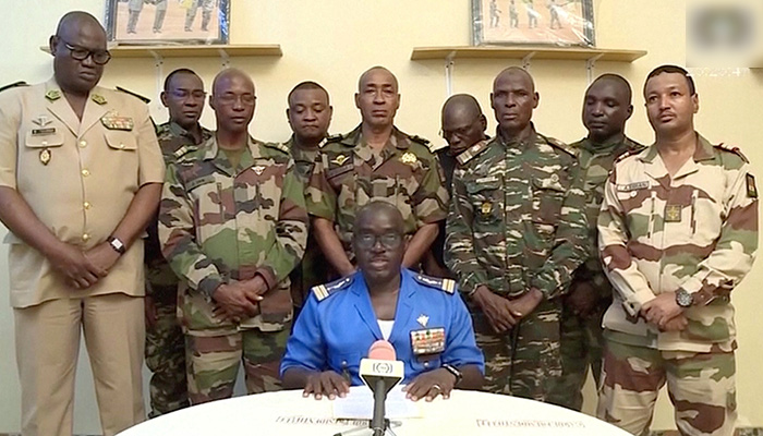 Niger Army spokesman Colonel Major Amadou Adramane speaks during an appearance on national television, after President Mohamed Bazoum was held in the presidential palace, in Niamey, Niger, July 26, 2023 in this still image taken from video.  — Reuters