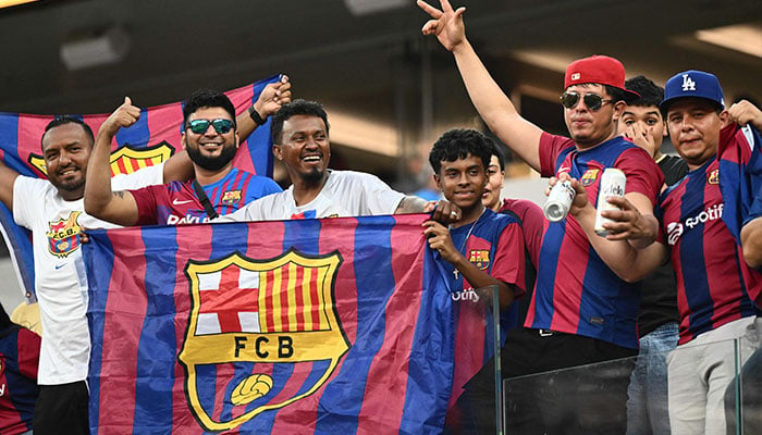 Barcelona fans cheer ahead of a pre-season friendly football match between Arsenal FC and FC Barcelona at SoFi Stadium in Inglewood, California, on July 26, 2023.—AFP