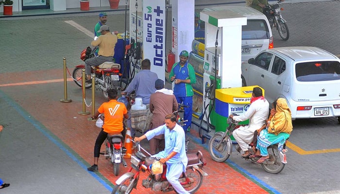 Petrol pump staffers decline to serve motorcyclists without helmets during the No Helmet No Petrol campaign at Kalma Chowk in Multan on July 19, 2023. — APP