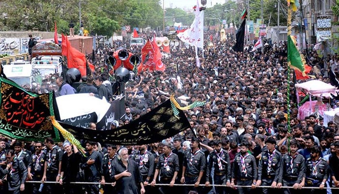 A large number of Shia Muslims attend the 10th Muharram procession to mark Ashoura at Empress Market Sadar in Karachi on July 29, 2023. — APP
