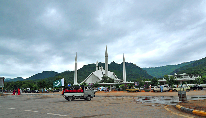 Thick clouds hover over Faisal Mosque early morning after rain in Islamabad, on August 15, 2022. — APP