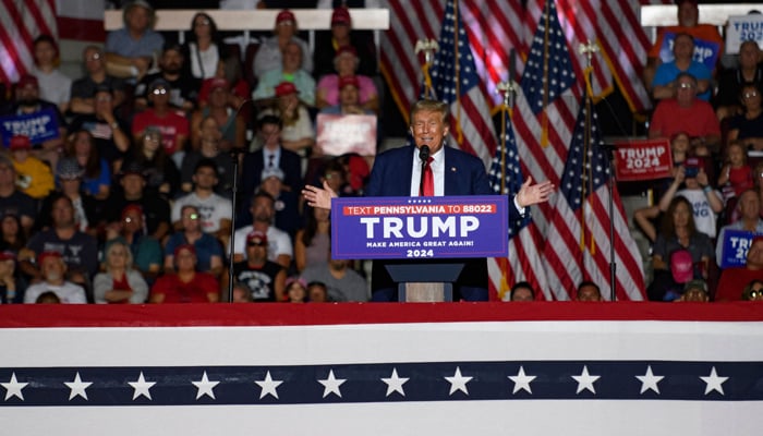 Former US President Donald Trump speaks to supporters during a political rally while campaigning for the GOP nomination in the 2024 election at Erie Insurance Arena on July 29, 2023 in Erie, Pennsylvania. — AFP
