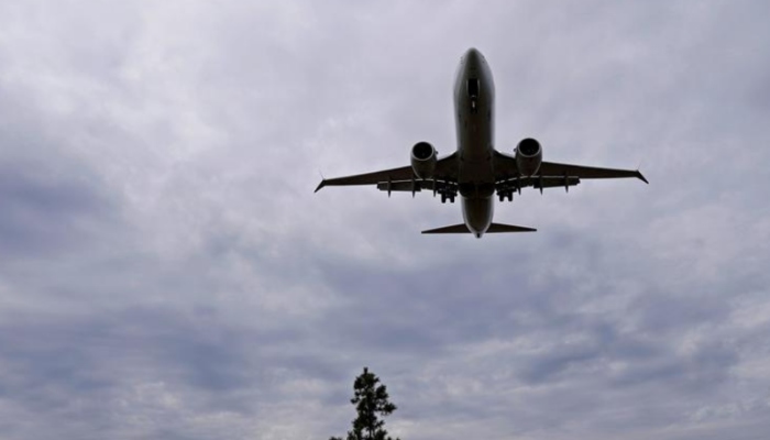 A plane photographed after it takes off. — Reuters/File