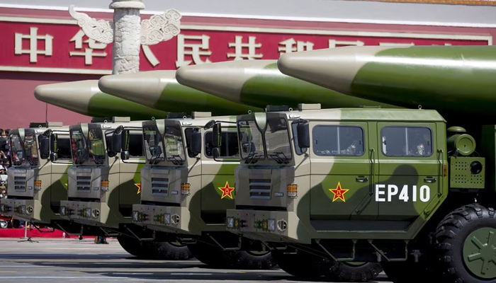 Military vehicles carrying DF-26 ballistic missiles travel past Tiananmen Gate during a military parade to commemorate the 70th anniversary of the end of World War II in Beijing. — Reuters/File