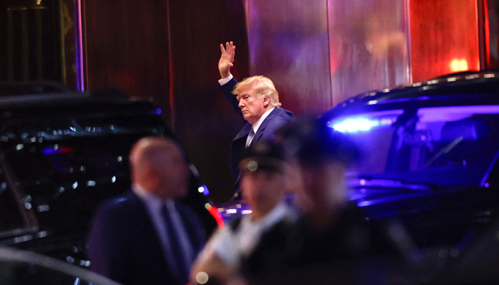 Former US president Donald Trump arrives at Trump Tower in New York on April 12, 2023. — AFP