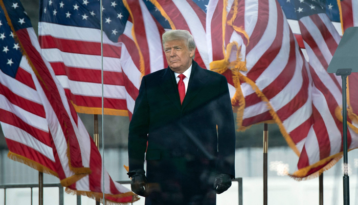 US President Donald Trump arrives to speak to supporters from The Ellipse near the White House on January 6, 2021, in Washington, DC. — AFP