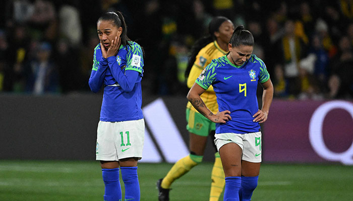 Adriana and Brazil´s forward #09 Debinha react after the Australia and New Zealand 2023 Women´s World Cup Group F football match between Jamaica and Brazil at Melbourne Rectangular Stadium, also known as AAMI Park, in Melbourne on August 2, 2023.—AFP