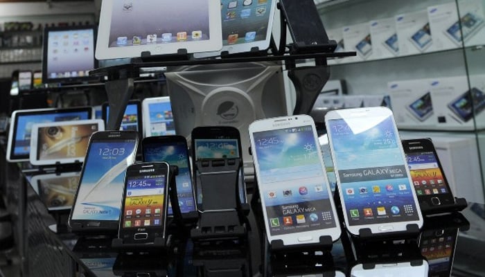 An undated image of smartphones displayed at a gadgets shop. — Facebook