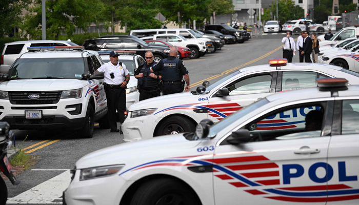 Police block a street near the E. Barrett Prettyman US Courthouse where former US President Donald Trump is to be arraigned on August 3, 2023, in Washington, DC. — AFP