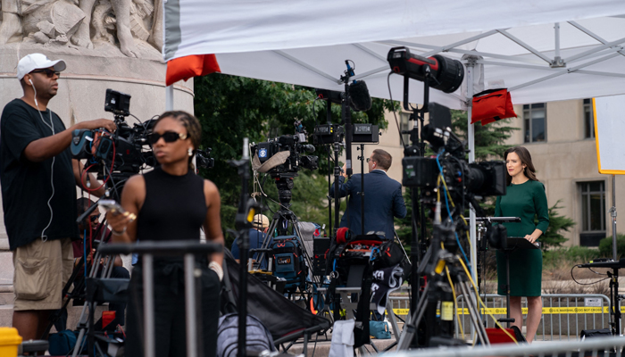 Members of the media set up outside the E. Barrett Prettyman US Courthouse in Washington, DC, on August 3, 2023, ahead of the arraignment of former US President Donald Trump. — AFP