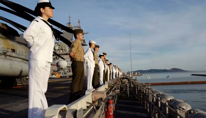 A US Navy sailor is alleged to have shared information with China about the USS Essex, seen here making a port call in Australia. Reuters/File