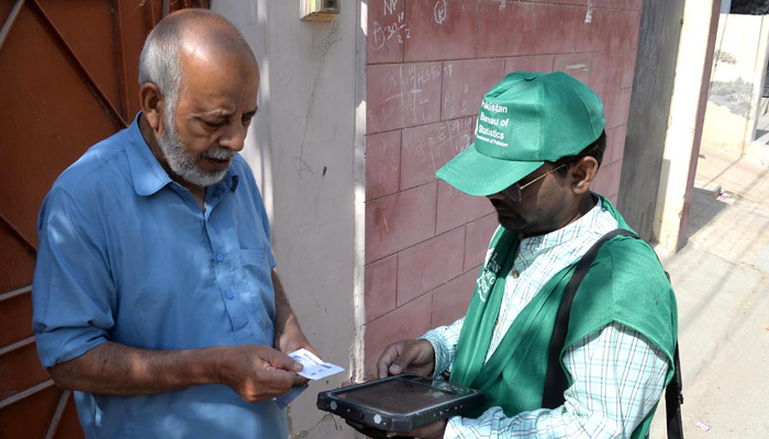 Enumerators of the Pakistan Bureau of Statistics visit door to door to collect data during the digital census in Hyderabad on March 1, 2023. — INP