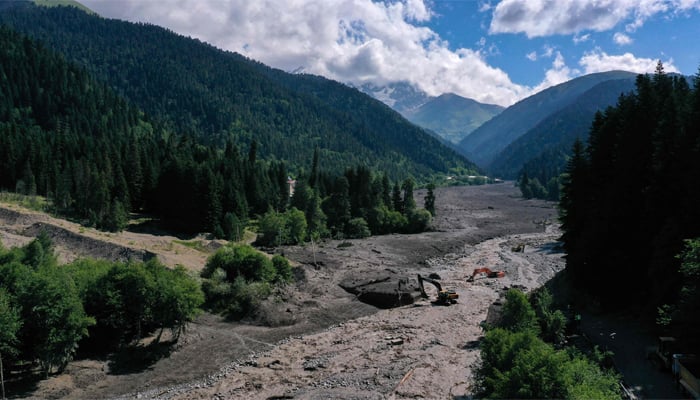 This aerial photo shows rescue personnel working at the site of a landslide in the western Georgian region of Racha on August 4, 2023. — AFP