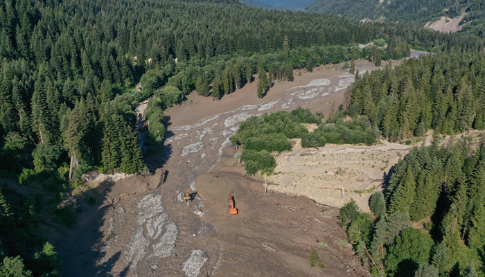 This aerial photo taken with a drone shows rescue personnel working at the site of a landslide in the western Georgian region of Racha on August 4, 2023. — AFP