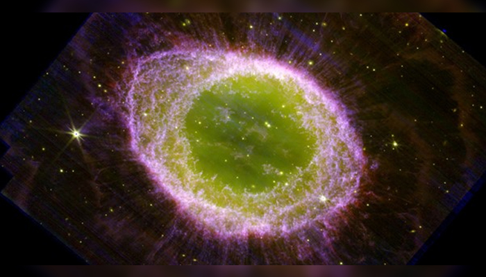 The image clearly shows the main ring, surrounded by a faint halo and with many delicate structures. The interior of the ring is filled with hot gas. The star which ejected all this material is visible at the very centre in this picture released on August 3, 2023. — University of Manchester website