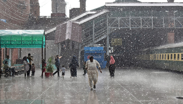 A view of heavy rainfall at the railway station in Lahore on August 1, 2023. — Online