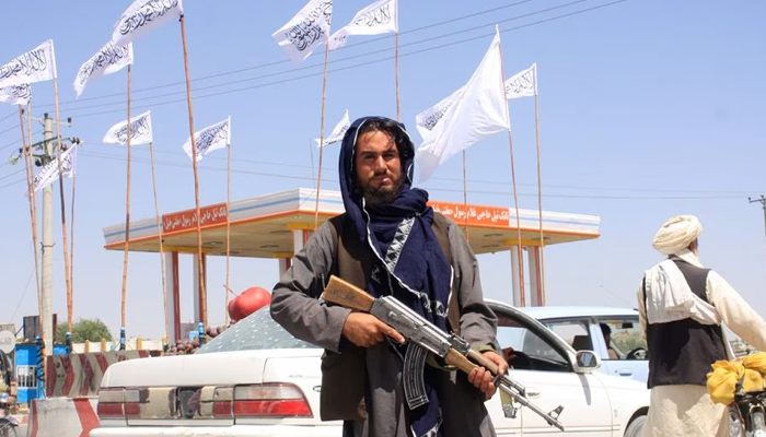 A Taliban fighter looks on as he stands at the city of Ghazni, Afghanistan August 14, 2021. — Reuters